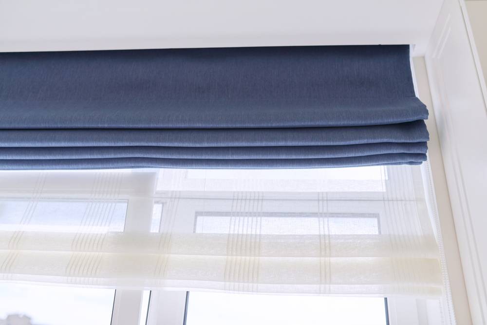 How do you layer window treatments?